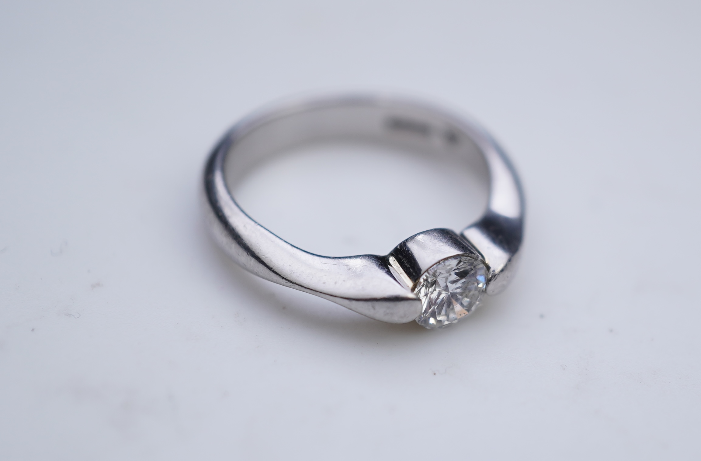 A diamond solitaire ring